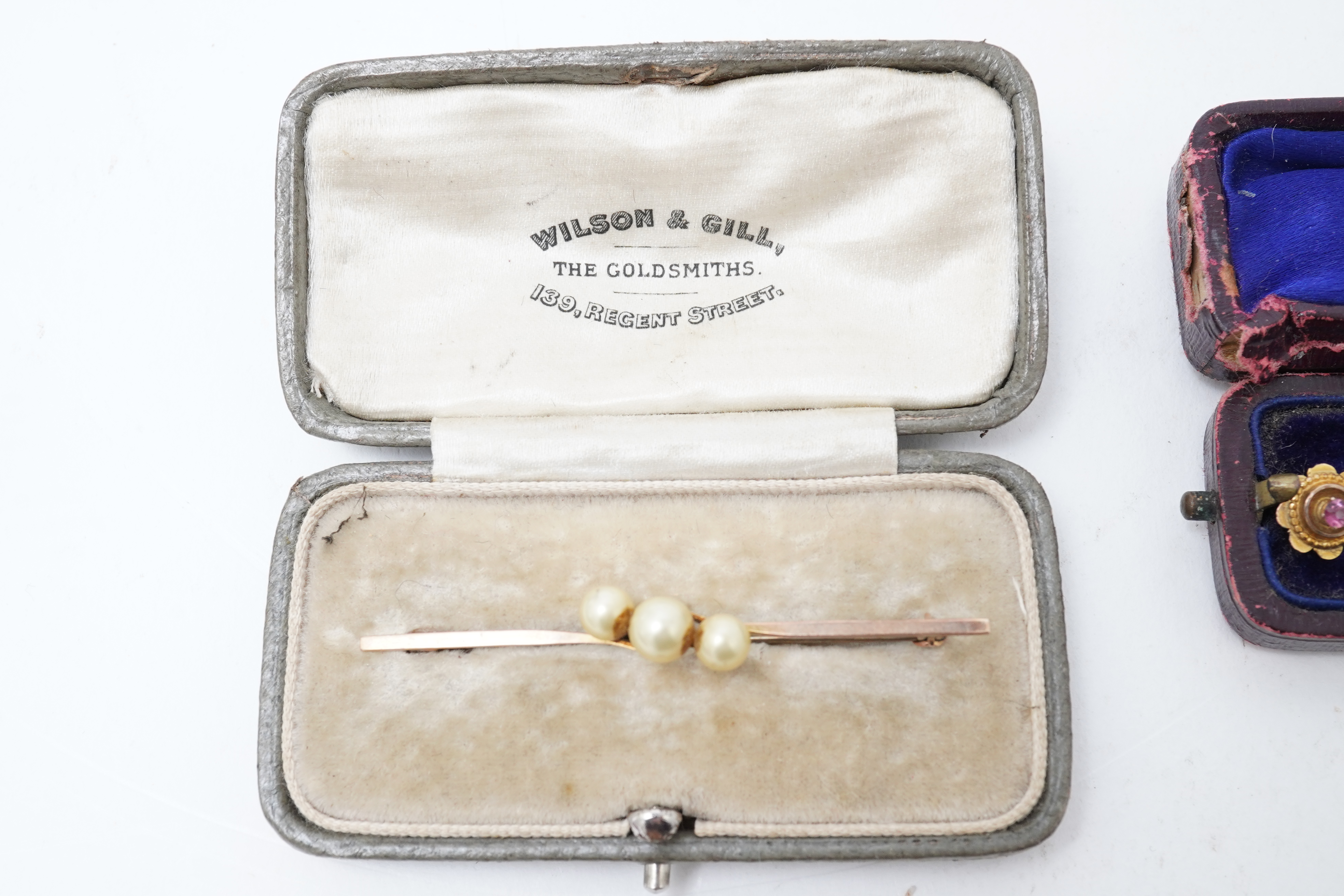 A collection of jewels including an Art Deco silver cigarette case